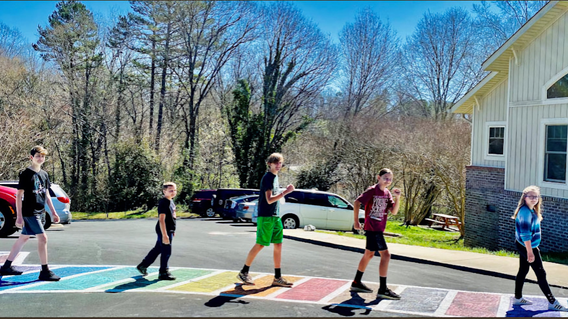 People gathering near the Unitarian Universalist Church of Catawba Valley